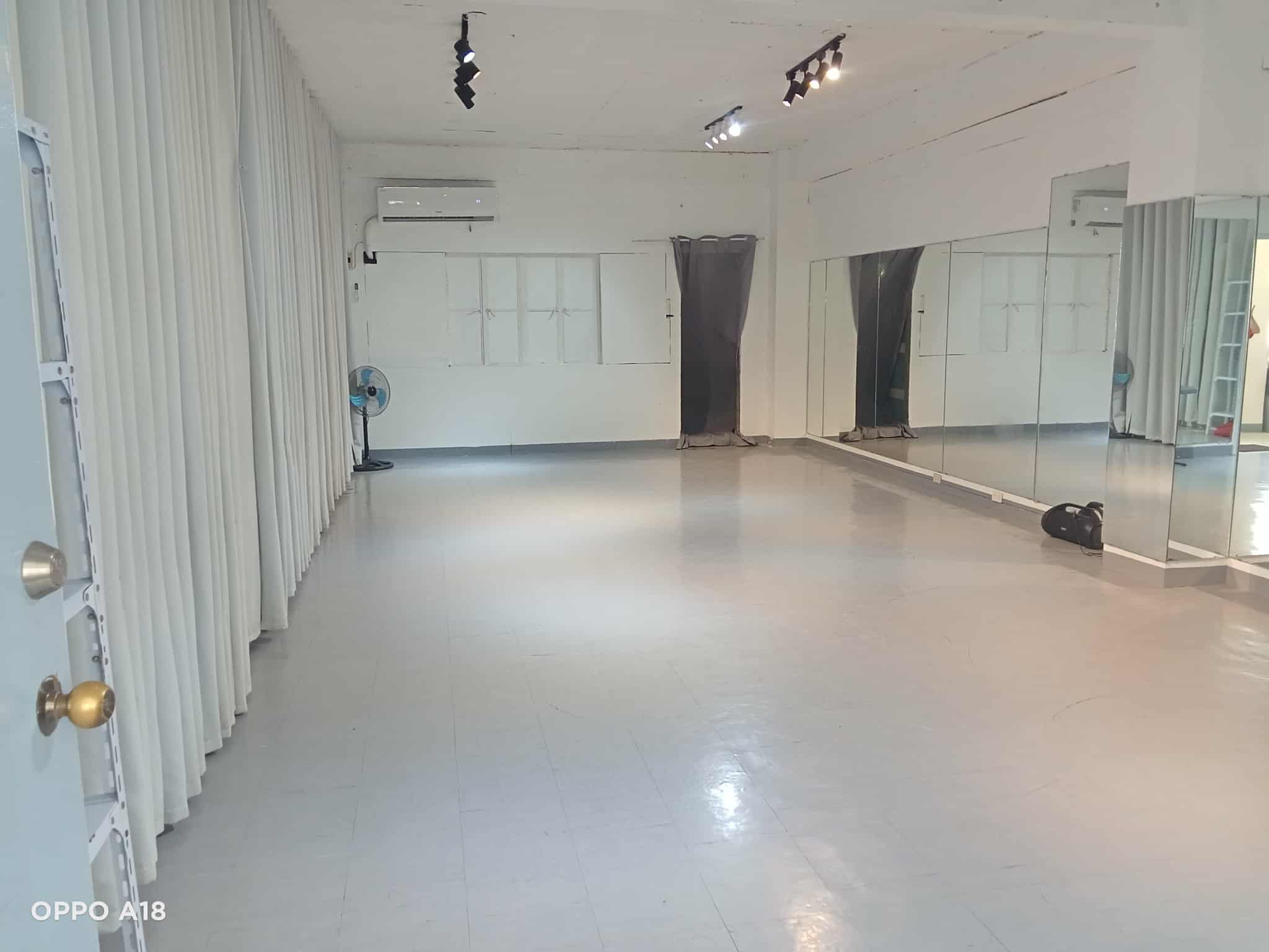 Spacious dance studio with mirrors
